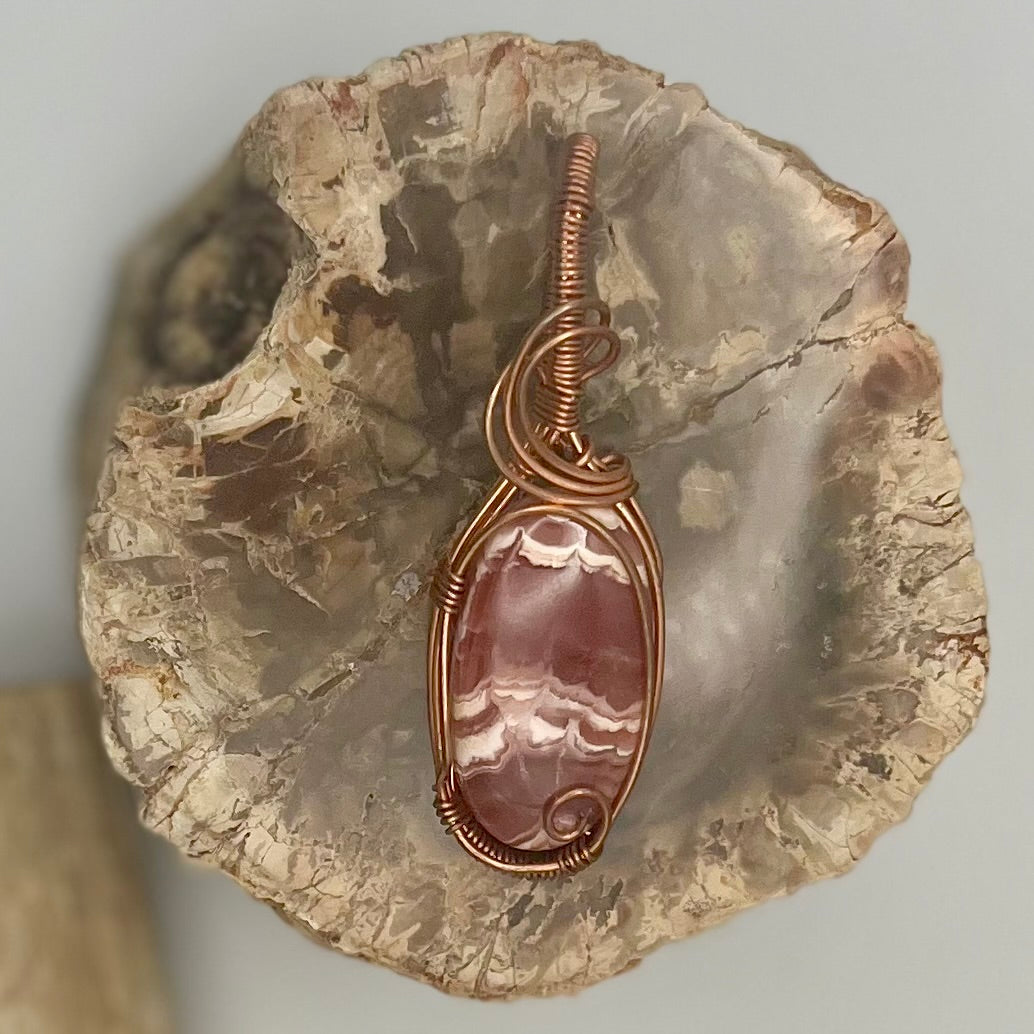 Rhodochrosite Compassion Pendant