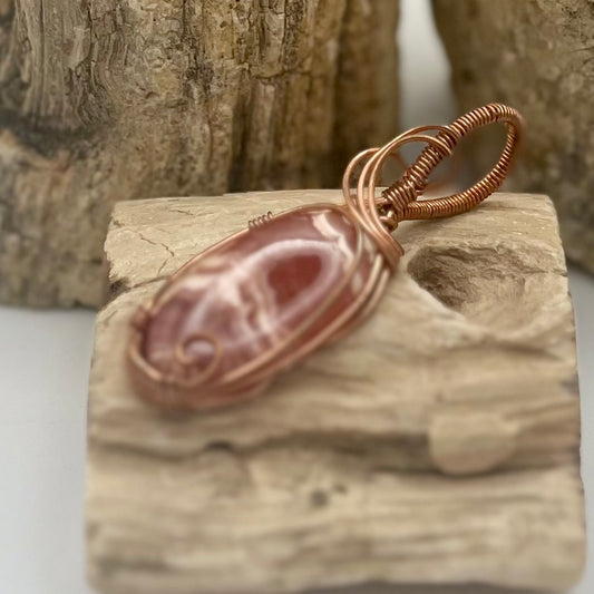 Rhodochrosite Compassion Pendant